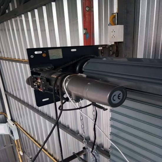 ติดตั้งมอเตอร์ประตูม้วนระบบไฟฟ้า ติดตั้งมอเตอร์ประตูม้วนระบบไฟฟ้า